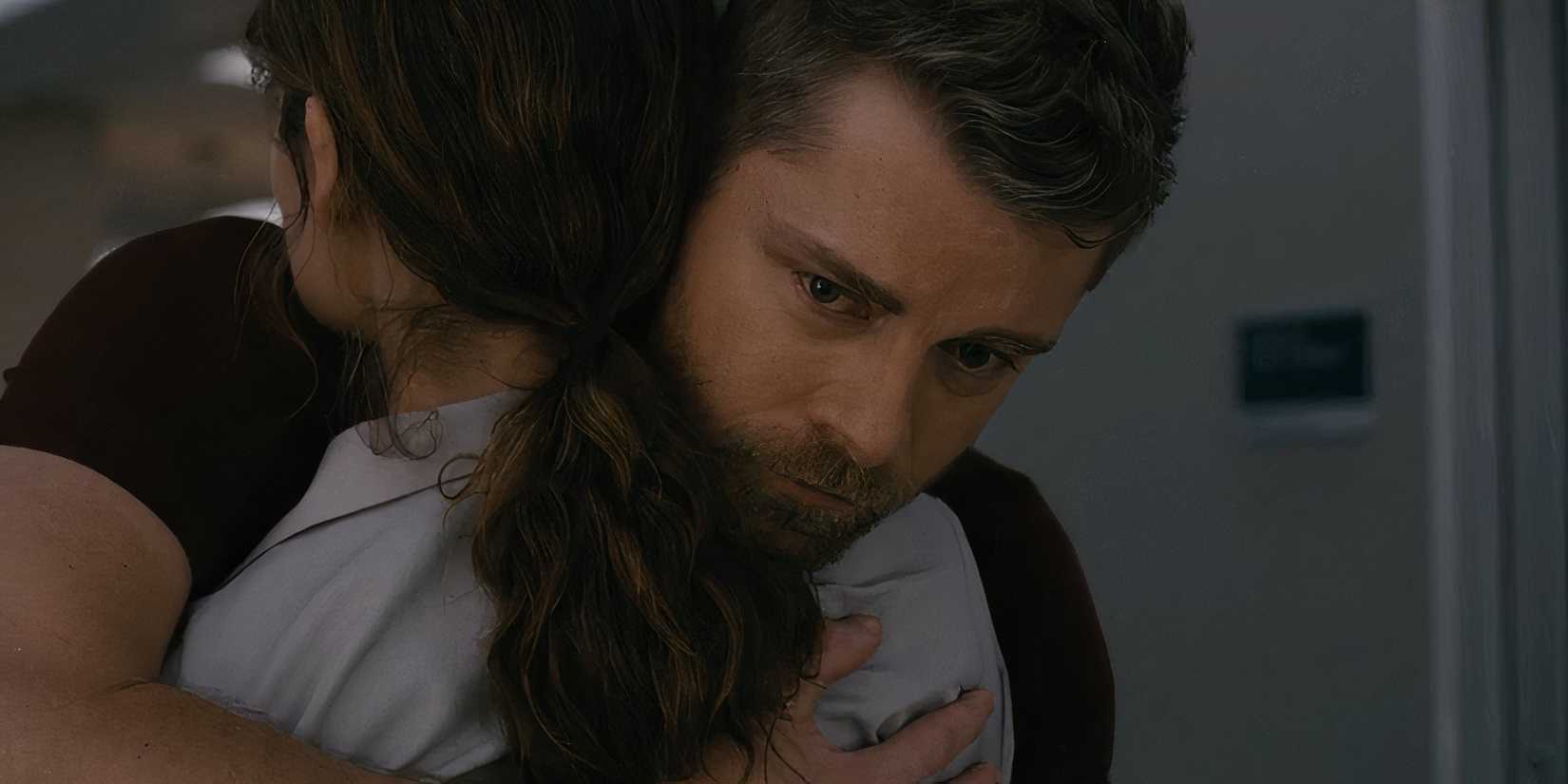 Luke Mitchell as Mitch Ripley hugging Sarah Ramos as Caitlin Lenox in Chicago Med