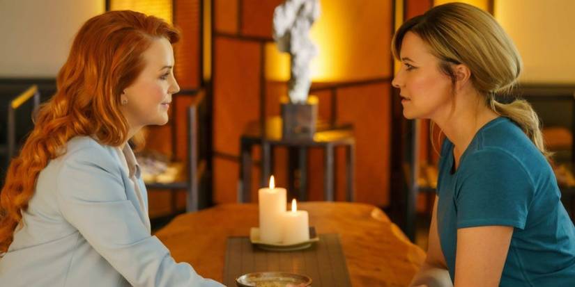 Clarissa Klein (Renee O'Connor) holding Alexa Crowe's (Lucy Lawless) in My Life is Murder.