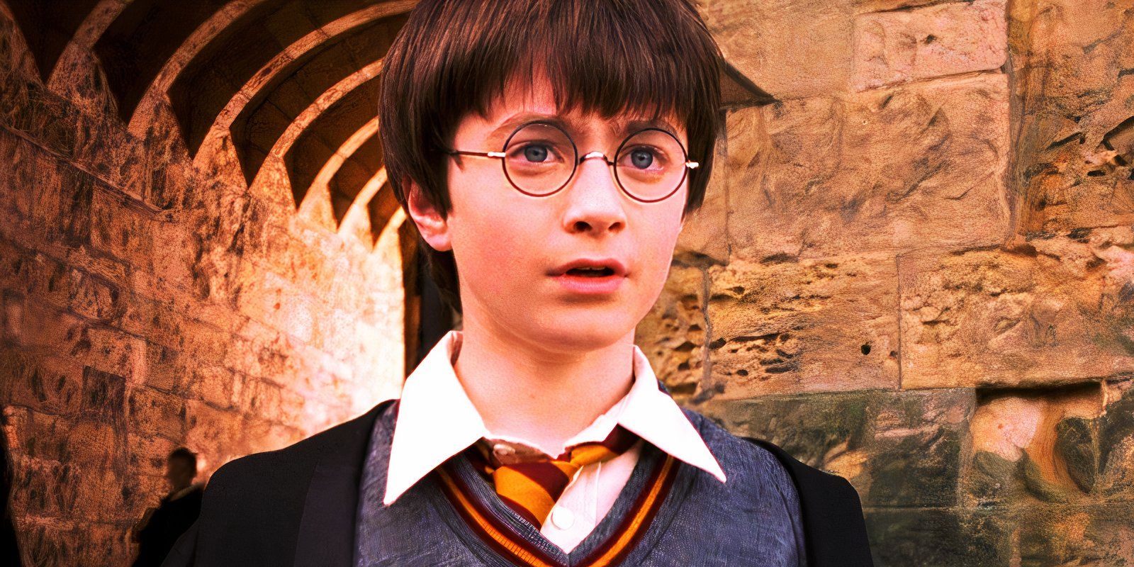 Daniel Radcliffe looks surprised as Harry in Harry Potter and the Philosopher's Stone