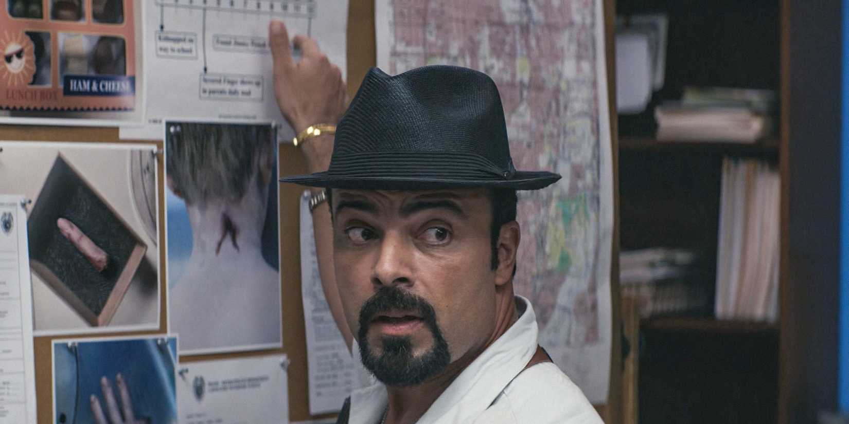 Det. Angel Batista ( James Martinez) sharing the advances in the investigation in Dexter: Original Sin Season 1 Ep 6