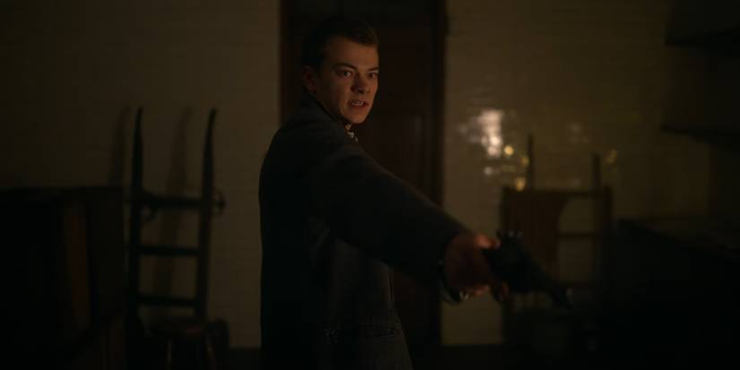 Erasmus "Duke" Shelby (Conrad Khan) holding a pistol in Peaky Blinders season 6, episode 6