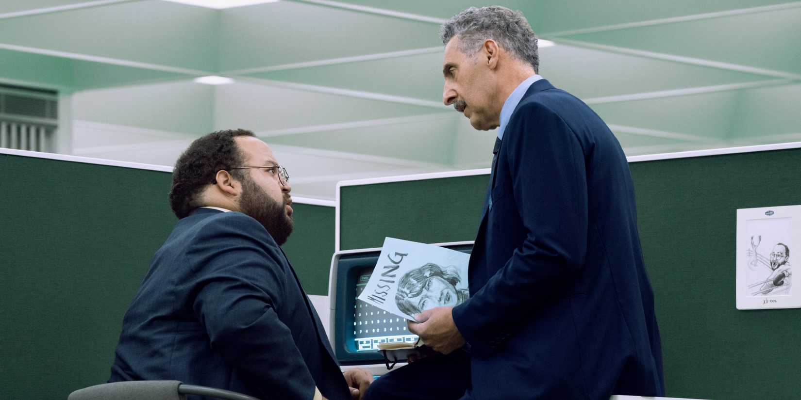 Dylan and Irving with a Missing Poster for Ms Casey in Severance season 2