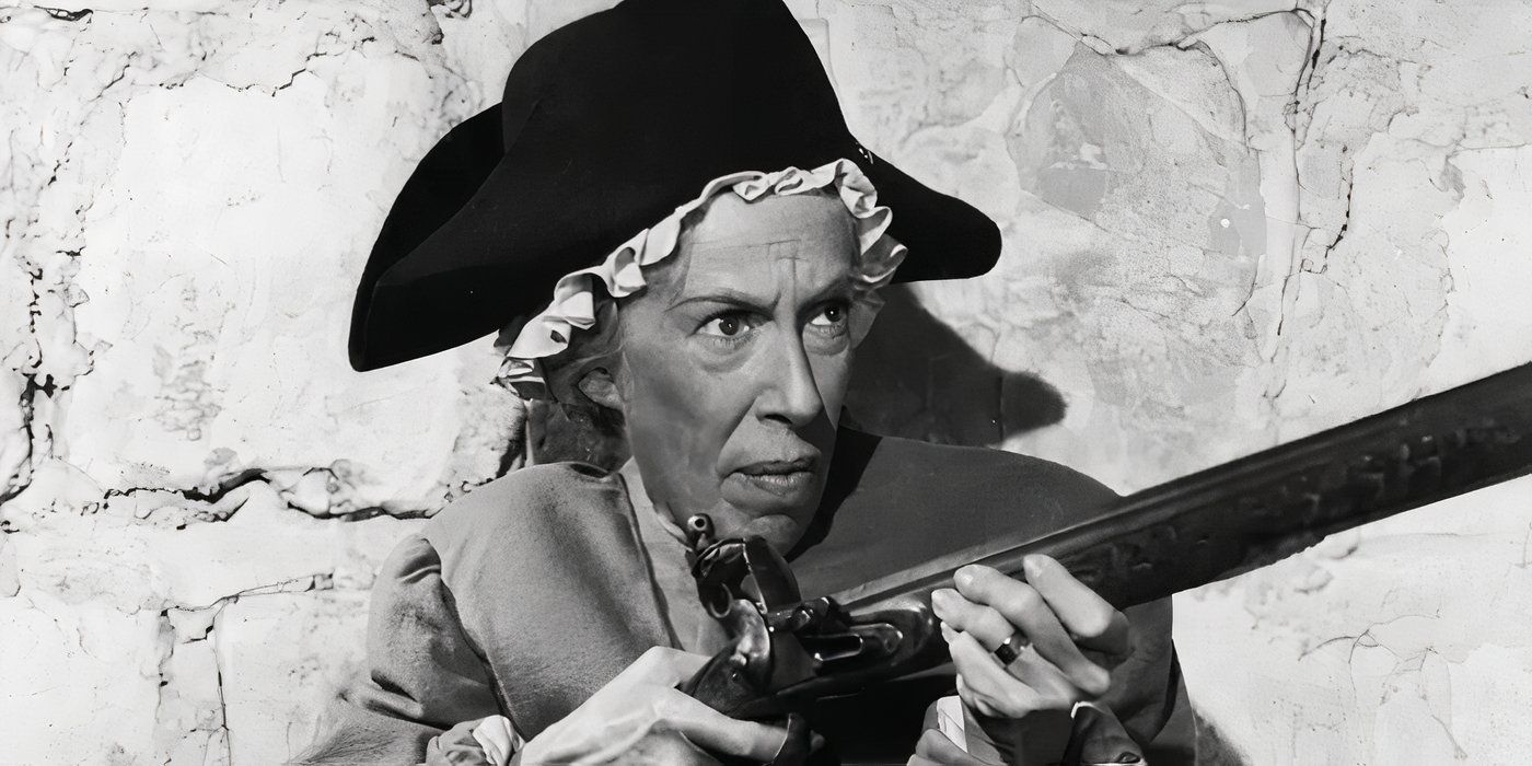 Edna May Oliver holding a sH๏τgun