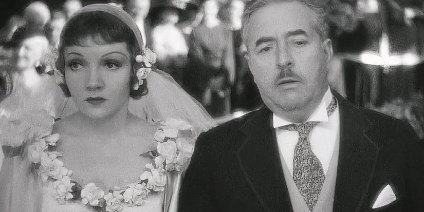 Ellie walks down the aisle with her father in It Happened One Night