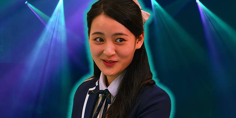 Eunice is in front of stage lights in XO, Kitty