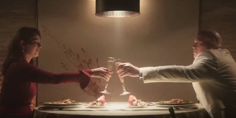 Fisk an Vanessa in Daredevil Born Again Trailer clinking glasses together
