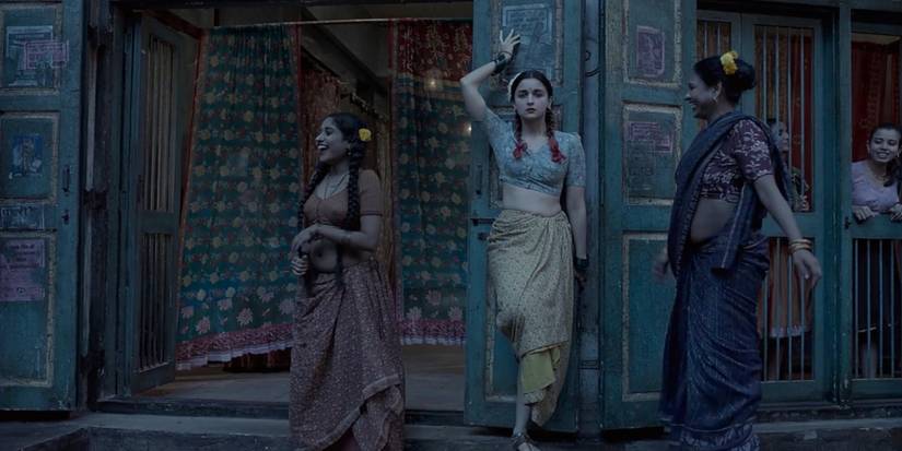 Gangubai Kathiawadi in front of brothel with two other women