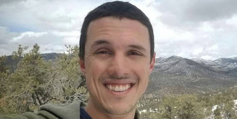 Gary Hinge (Eric Mencis) smiling at the camera in Horror in the High Desert.