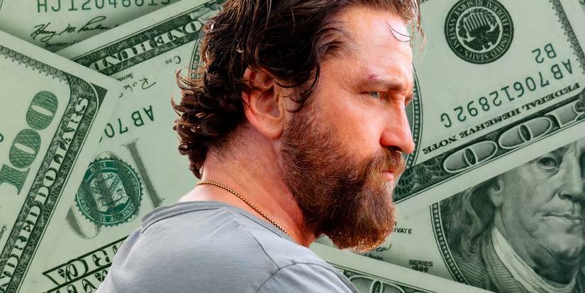 Gerard Butler from Den of Thieves 2 viewed in profile in front of money