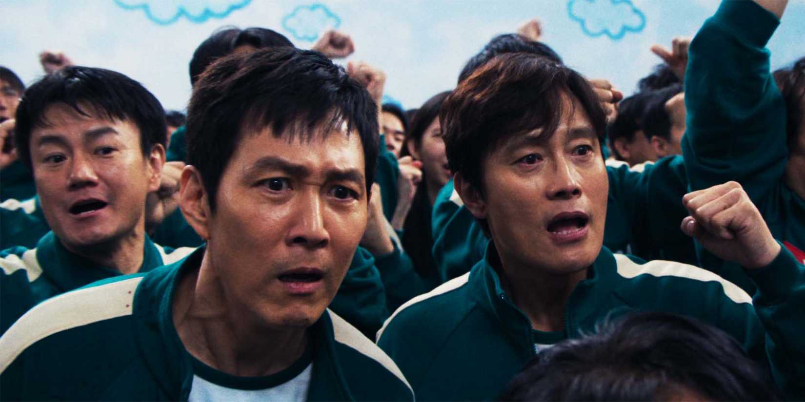 Gi-hun and The Front Man cheering on Squid Game season 2, episode 5