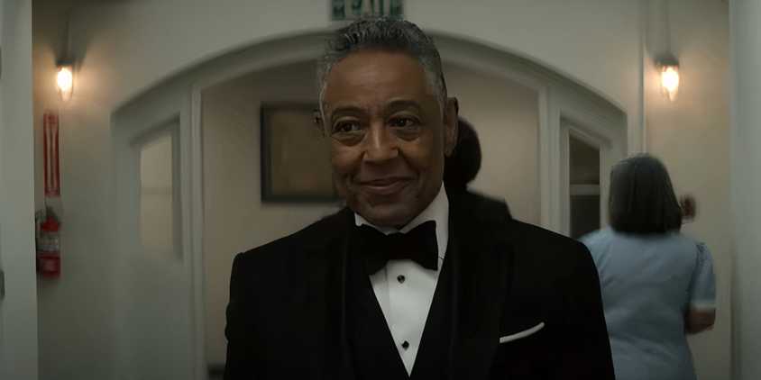 Giancarlo Esposito nodding and smiling in The Residence