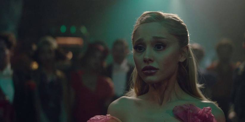 Glinda looking at Elphaba at the Ozdust in Wicked