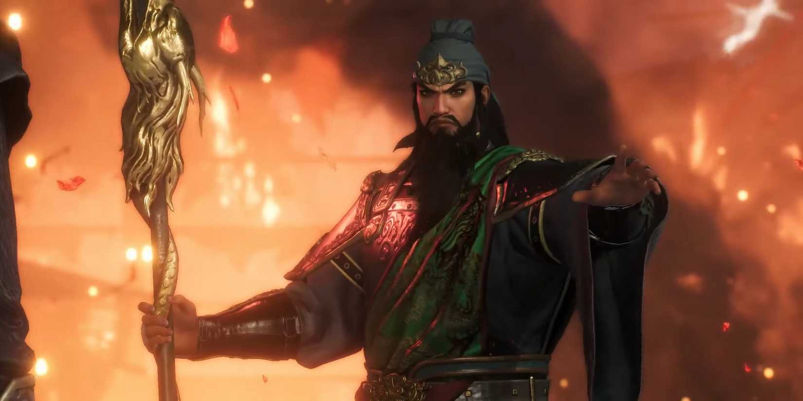 Guan Yu surrounded by fire, with an arm outstretched in a screenshot from Dynasty Warriors Origins.-1