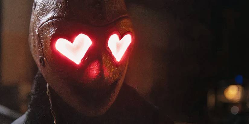 The Heart Eyes Killer with glowing eyes in Heart Eyes