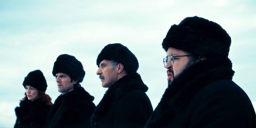 Helly, Mark, Irving, and Dylan stand outside in fur coats and hats in Severance season 2