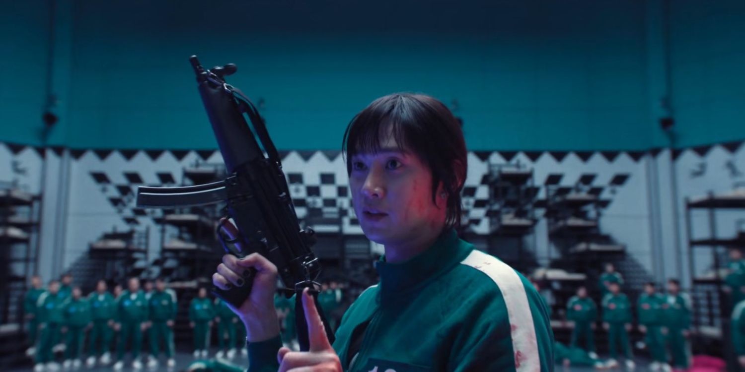 Hyun-ju shows the players how to use firearms in Squid Game 