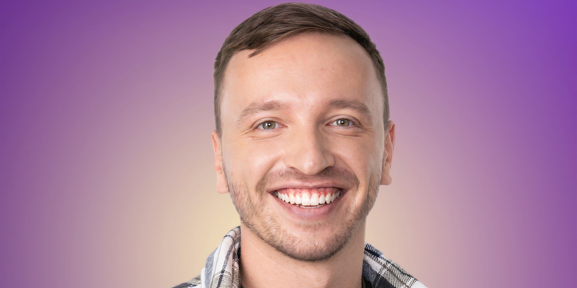 Love Is Blind: Germany season 1 Ilias Pappas smiling during the promo shoot wearing a checked shirt