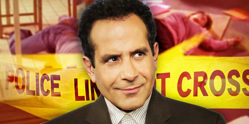 Adrian Monk (Tony Shalhoub) smirking in front of police tape in Monk