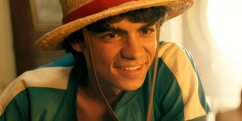 Iñaki Godoy as Monkey D. Luffy smiling while leaning forward in One Piece season 1