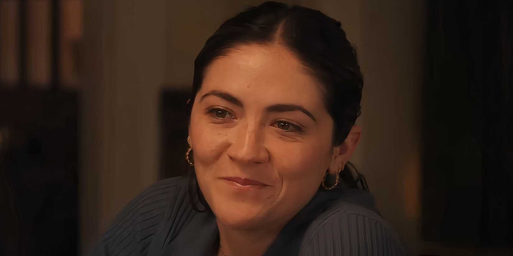 Isabelle Fuhrman as Charlotte smiling in Wish You Were Here
