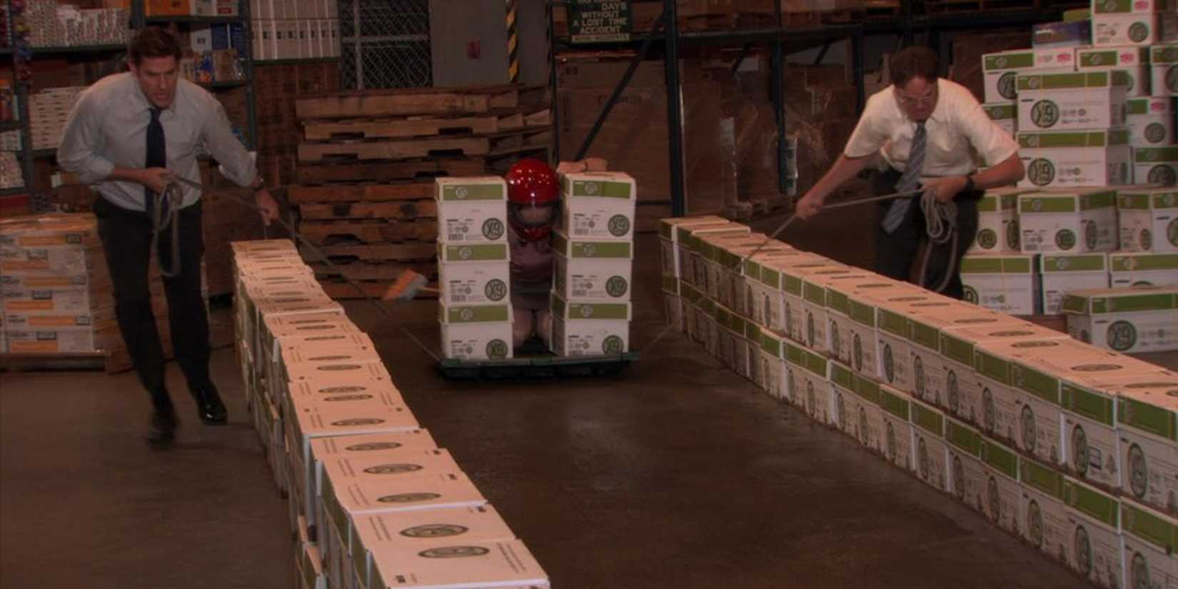Jim, Dwight, and Erin in the warehouse in The Office