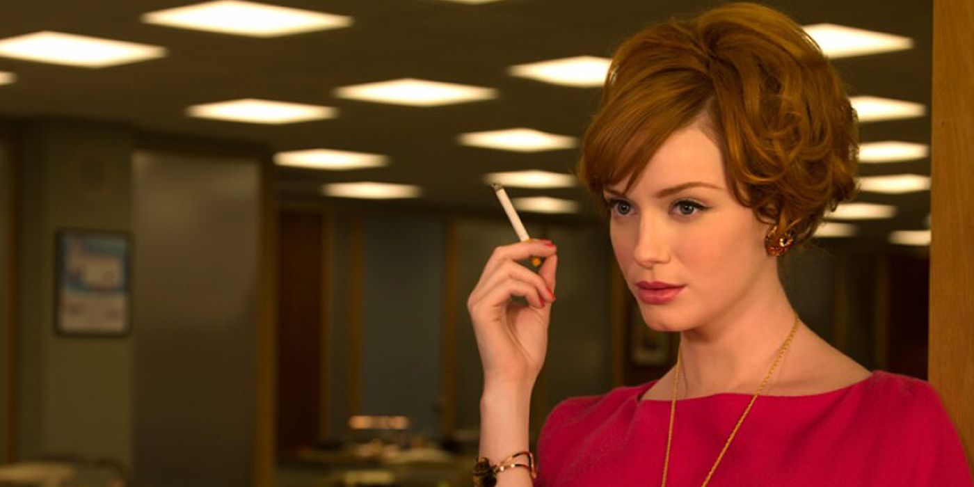 joan smoking a cigarette in the office in mad men