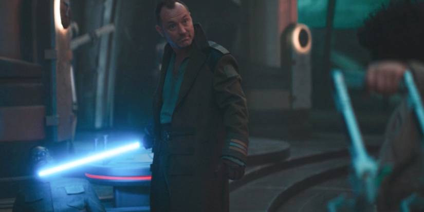 Jod Na Nawood holding a lightsaber in Skeleton Crew episode 8