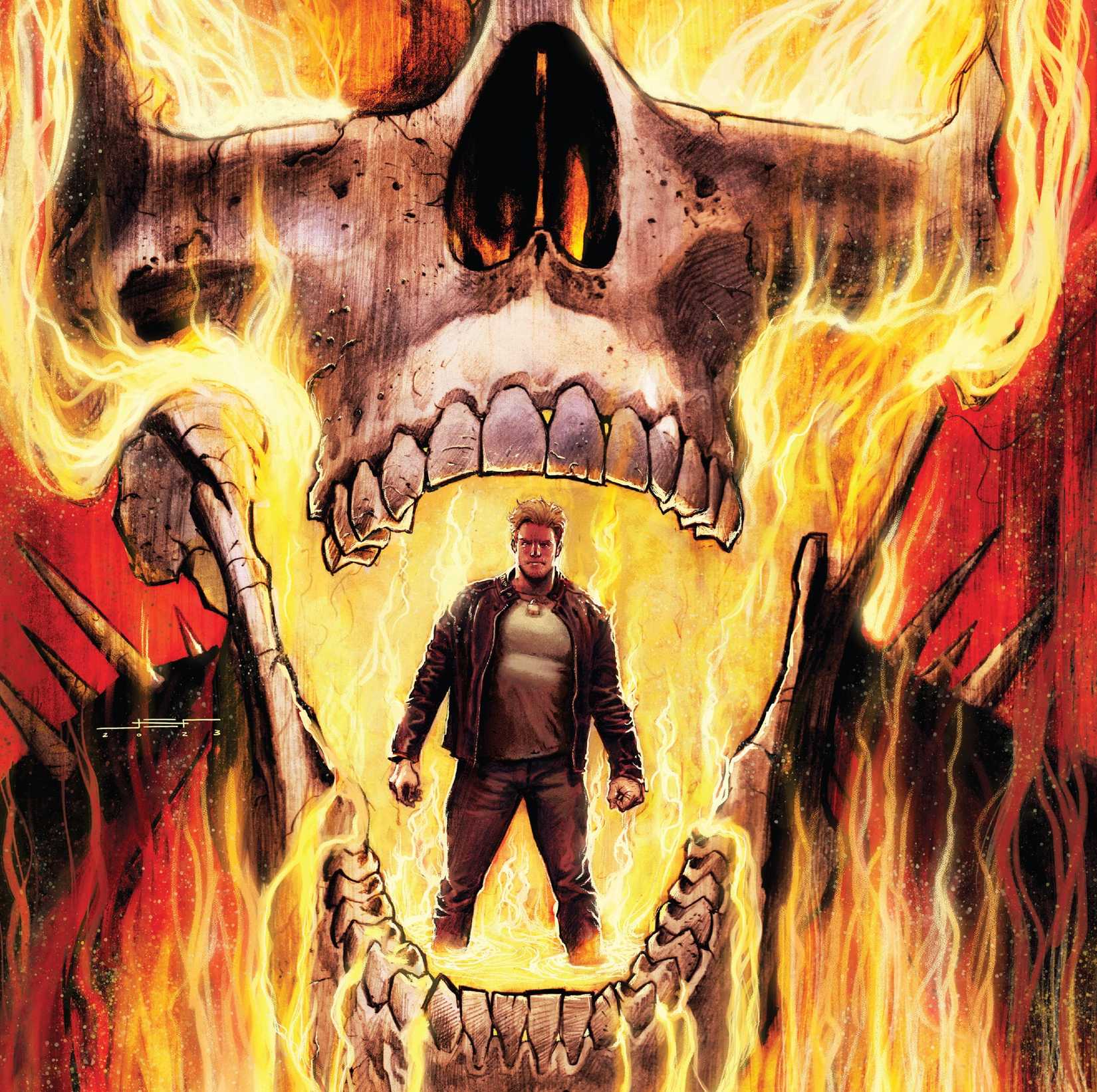 Johnny Blaze stands in the mouth of a flaming skull.