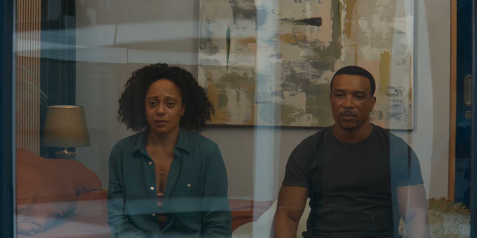 Kat and Josh sitting side by side with devastated expressions in Missing You