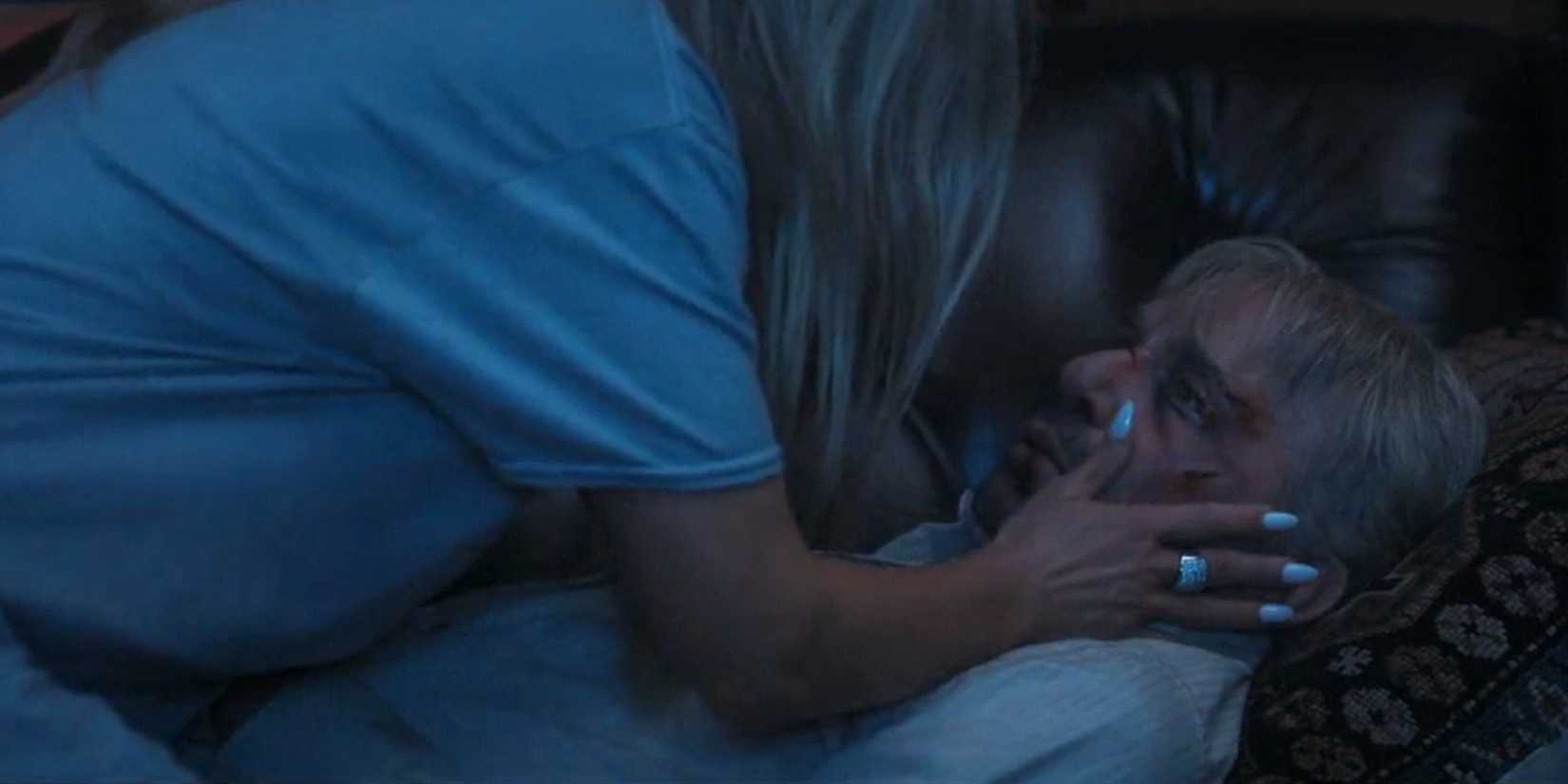 Angela (Ali Larter) holding a beaten Tommy Norris (Billy Bob Thornton) in Landman season 1, episode 10