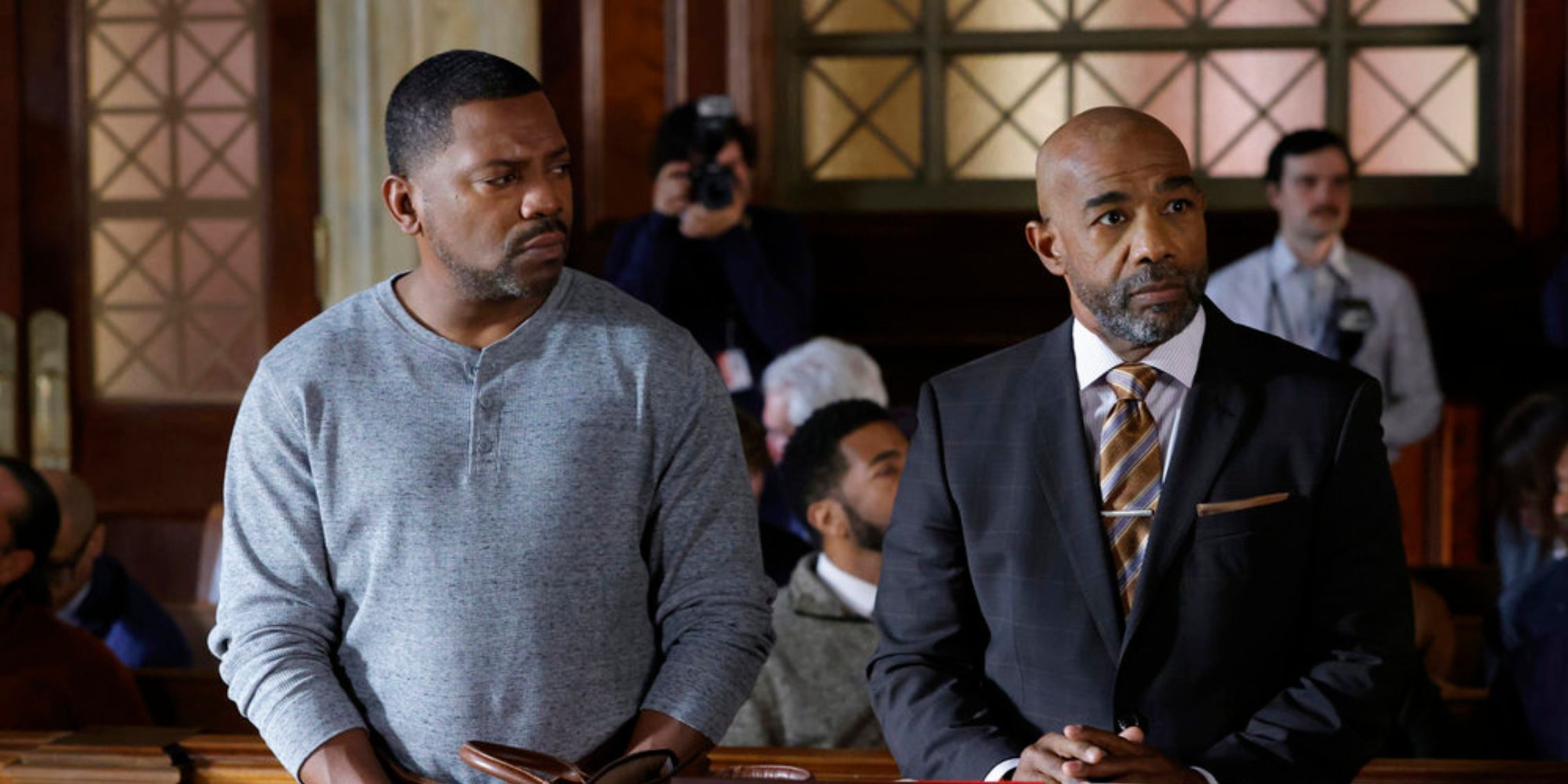 Law and Order A defendant (Mekhi Phifer) stands in court with his attorney (Michael Beach)