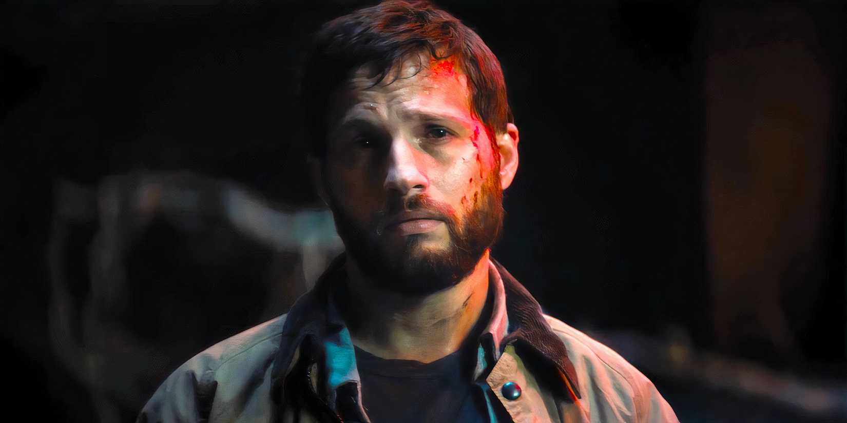 Logan Marshall-Green as Grey looking upset with blood on his face in Upgrade
