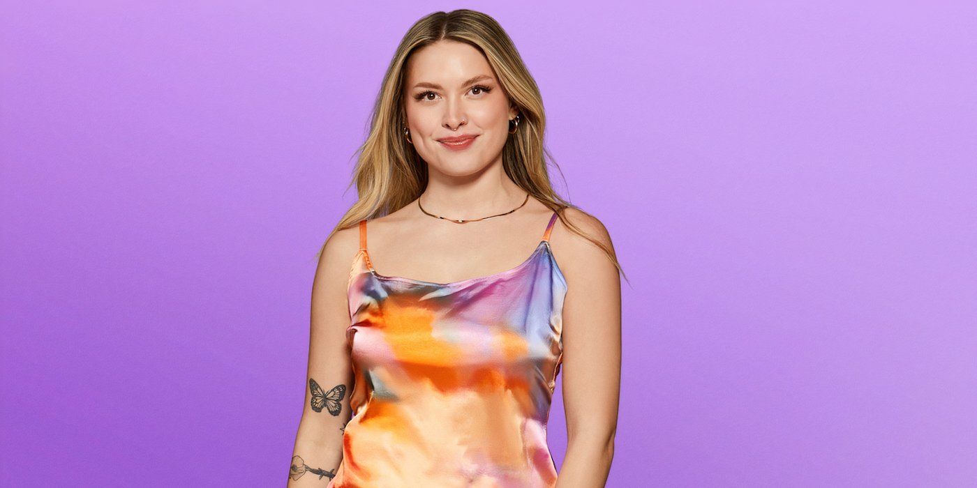 Love is the 8th season of Madison Errichello, in a colorful summer dress without straps, showing his butterfly tattoo on his right arm.