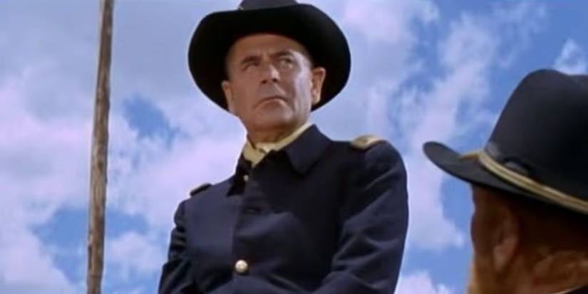 Major Wolcott (Glenn Ford) sitting on his horse and looking stubborn in A Time for Killing.