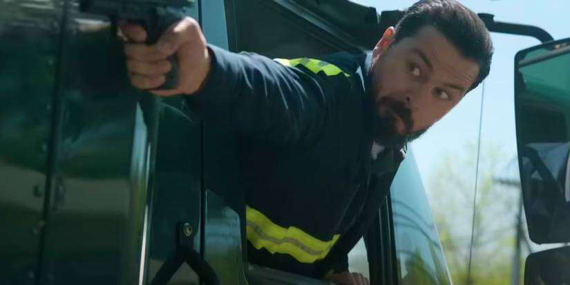 Markus fires a gun from a truck in The Night Agent