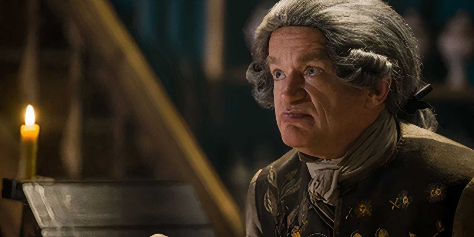 Master Raymond with a bottle in Outlander