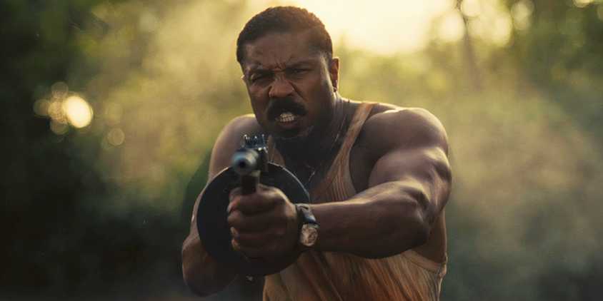 Michael B Jordan with a tommy gun in Sinners