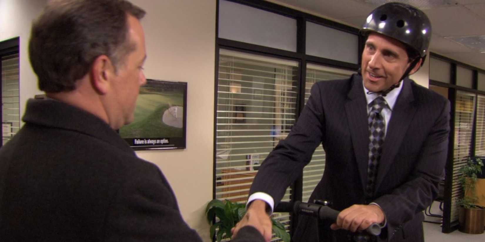 Michael greets the banker in The Office