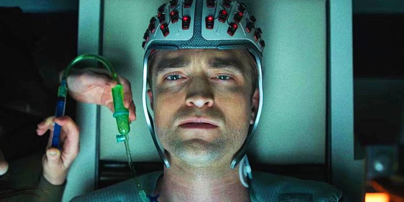 Mickey (Robert Pattinson) wearing a helmet in Mickey 17