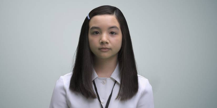 Miss Huang in front of a blank wall in Severance season 2