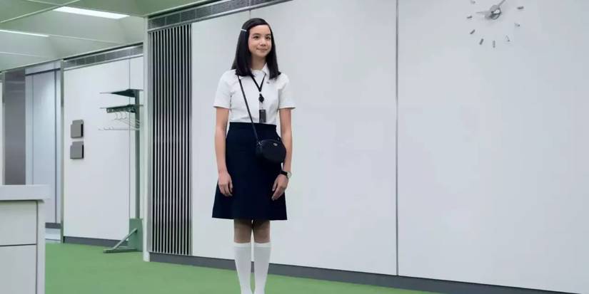 Miss Huang standing in the Macrodata Refinemenet department office in Severance season 2