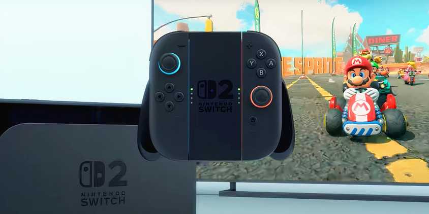 Nintendo Switch 2 with mario kart on a tv behind it.