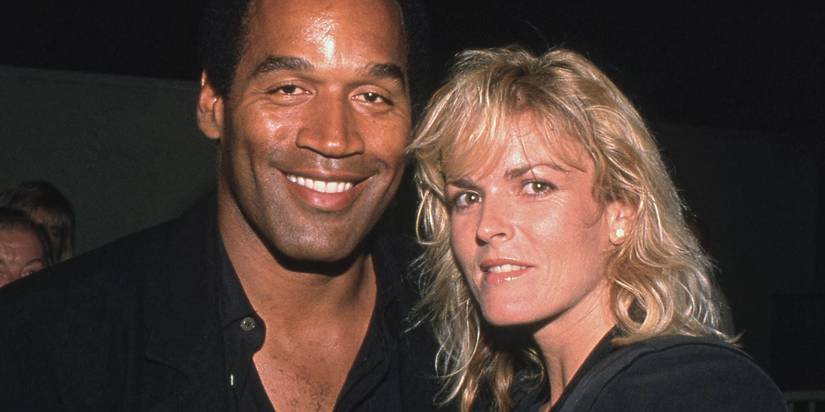 OJ Simpson and Nicole Brown smiling in a photo together, via American Manhunt: OJ Simpson