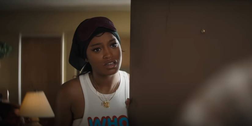 Keke Palmer looking exasperated at her door in One of Them Days