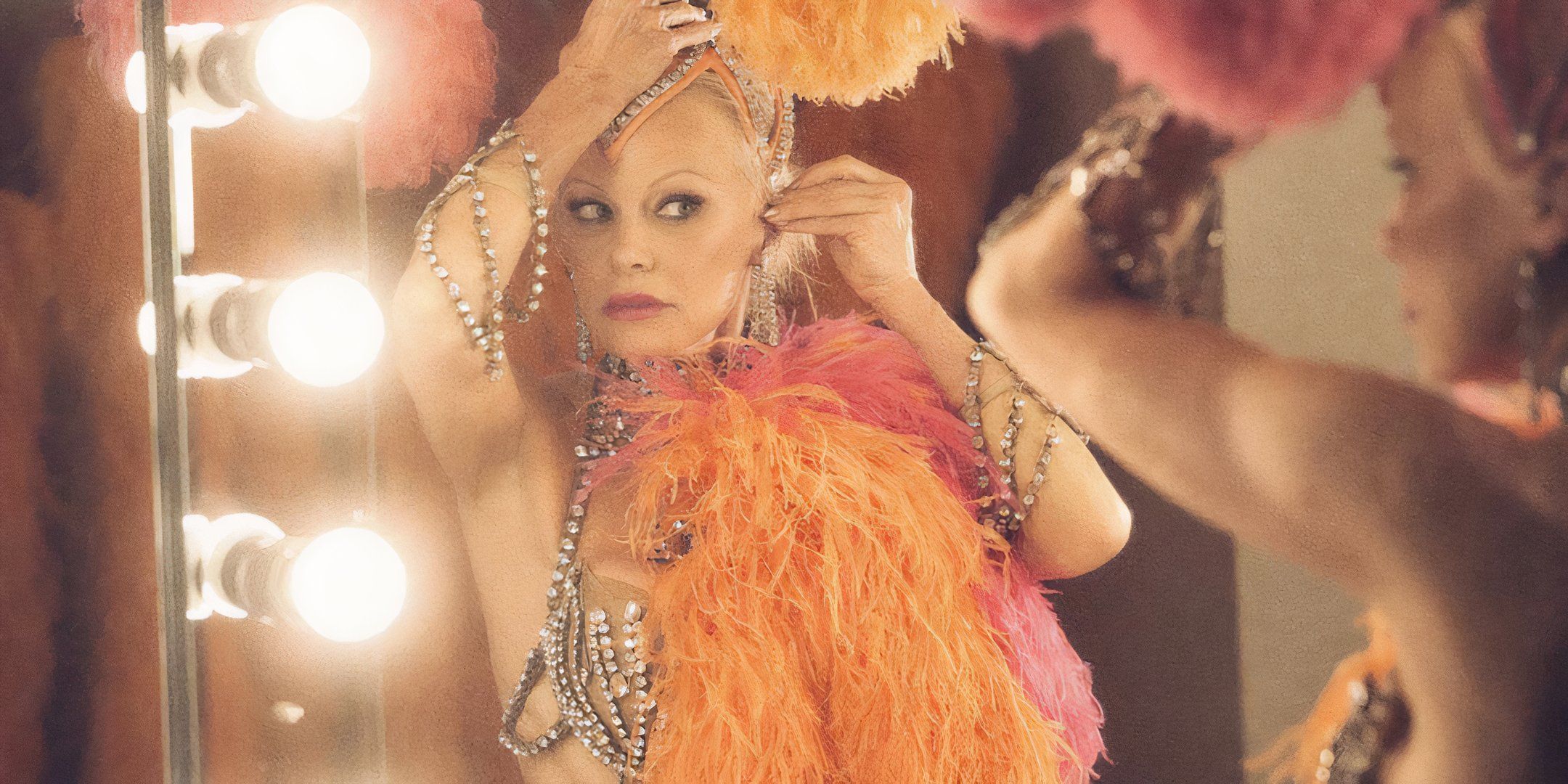 Pamela Anderson's Shelly adjusting her headwear in The Last Showgirl