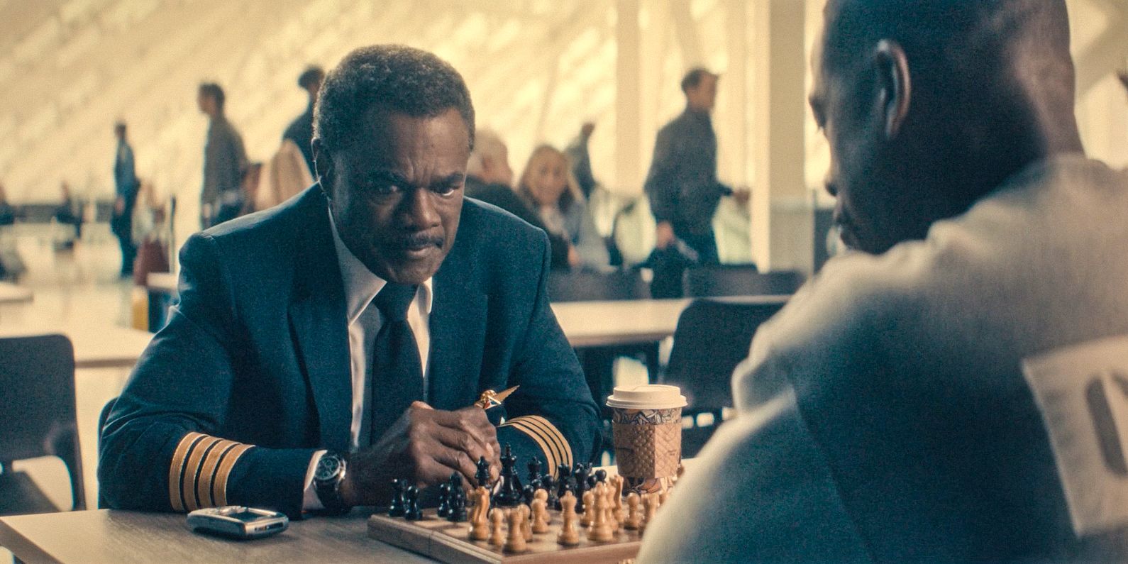 Xavier (Sterling K. Brown) and his father (Glynn Turman) playing chess in Paradise episode 3