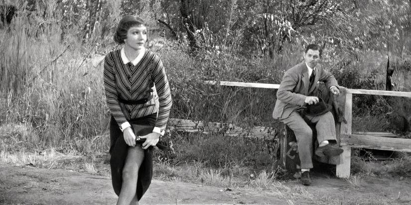 Peter watches as Ellie lifts her skirt in It Happened One Night