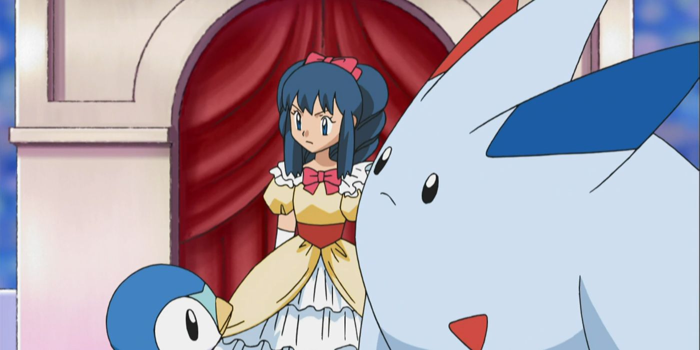 Dawn, Piplup, and Togekiss prepare for the Grand Festival's finale.