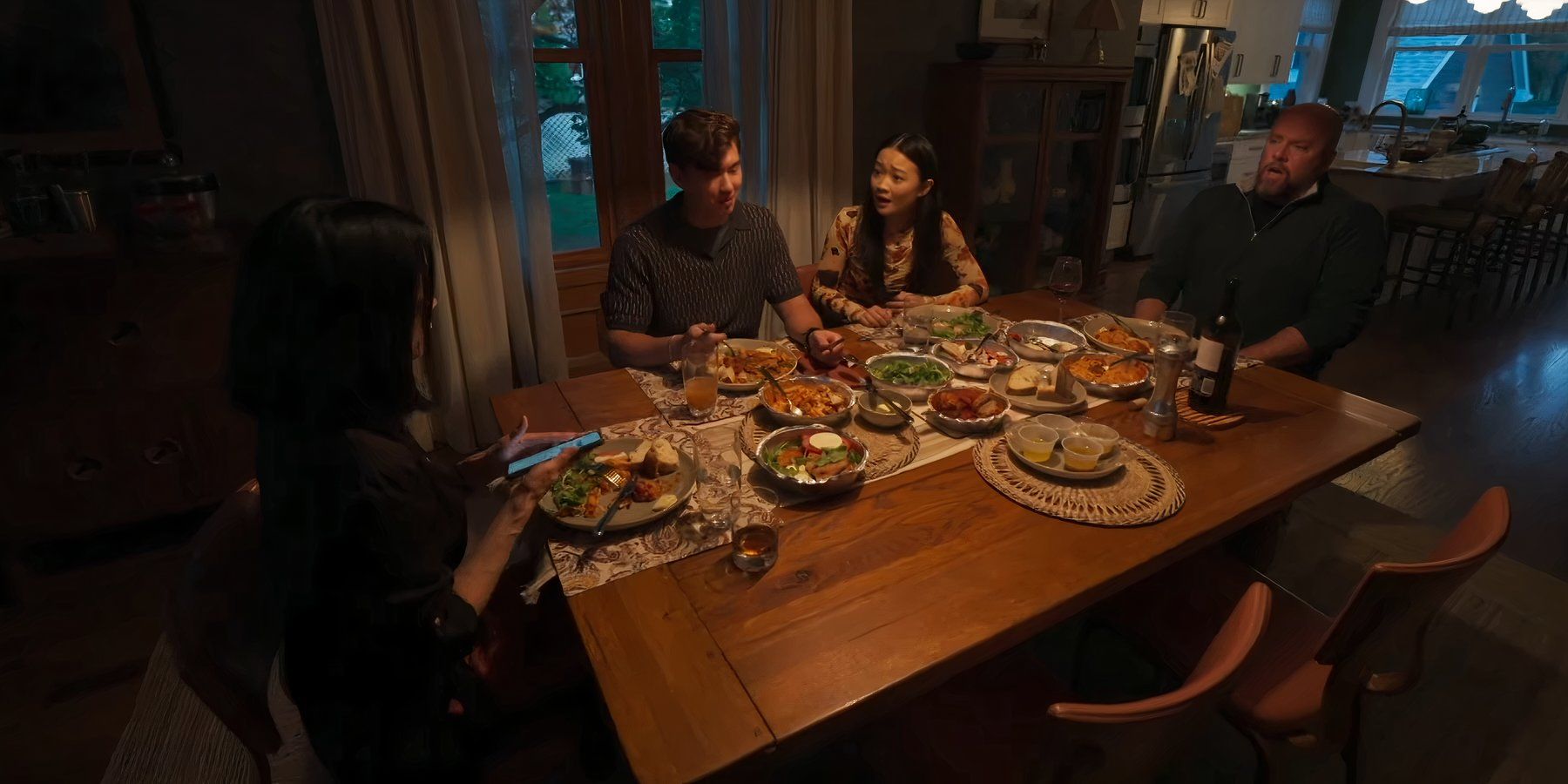 Lucy Liu, Eddy Maday, Callina Liang, and Chris Sullivan sitting at the dinner table in Presence