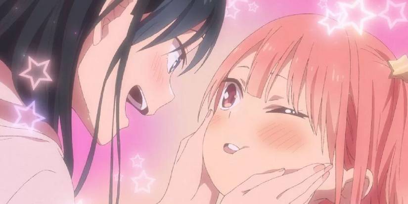 Pseudo Harem's Ayaka gets her face squished and smiles while closing one eye.